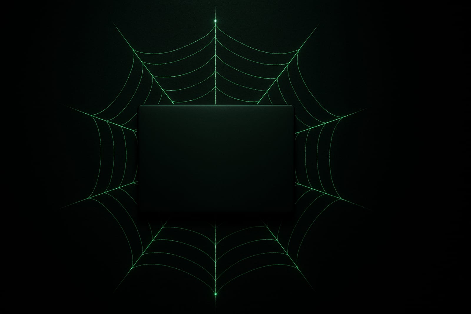 A laptop sitting at the center of a glowing amber web